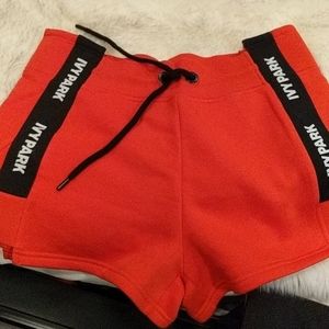 Ivy Park taped red shorts NWOT